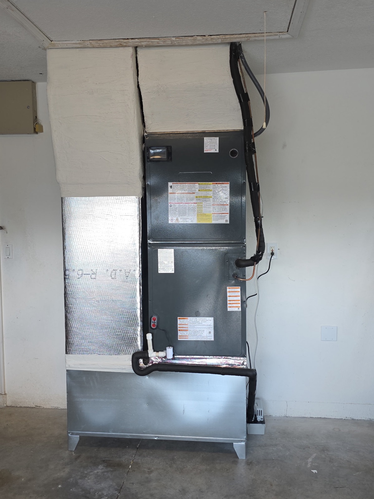 Garage Air Handler with Insulated Plenum in Tampa Bay, FL by Ares Construction