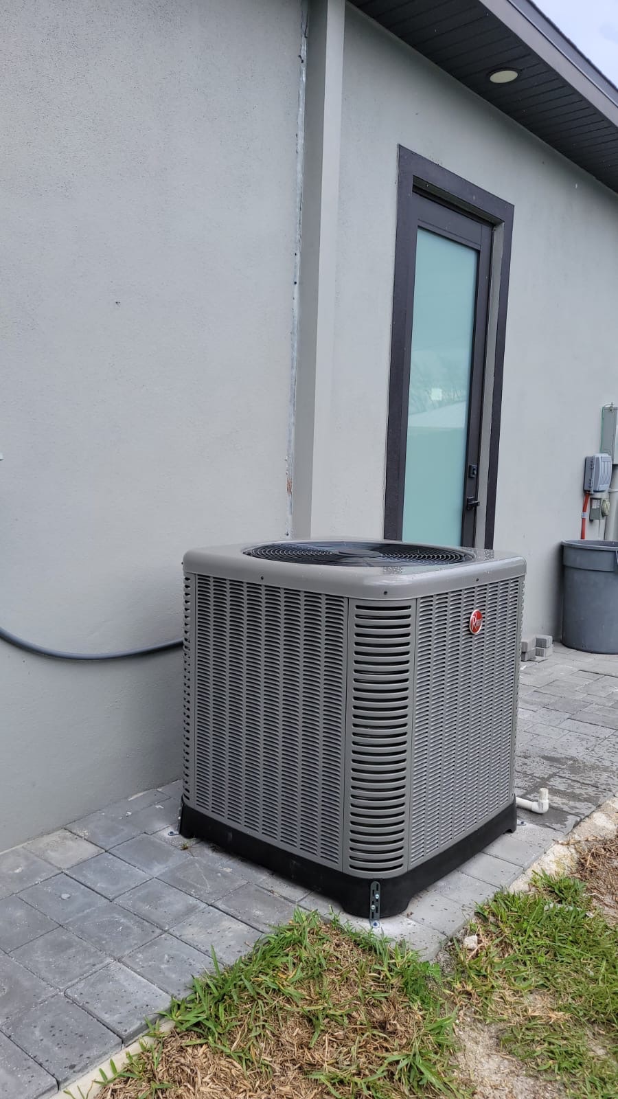 New Rheem condenser installed by Ares Construction